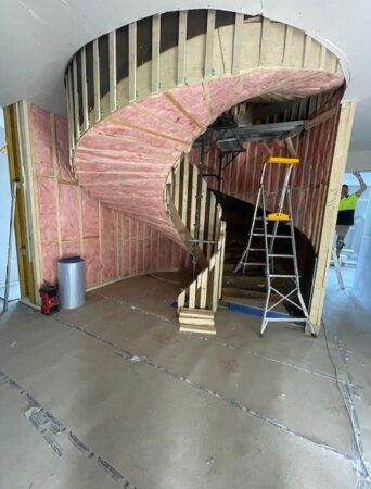 Residential Insulation - complicated staircase insulation, with pink Batts - By Climate Control Insulation